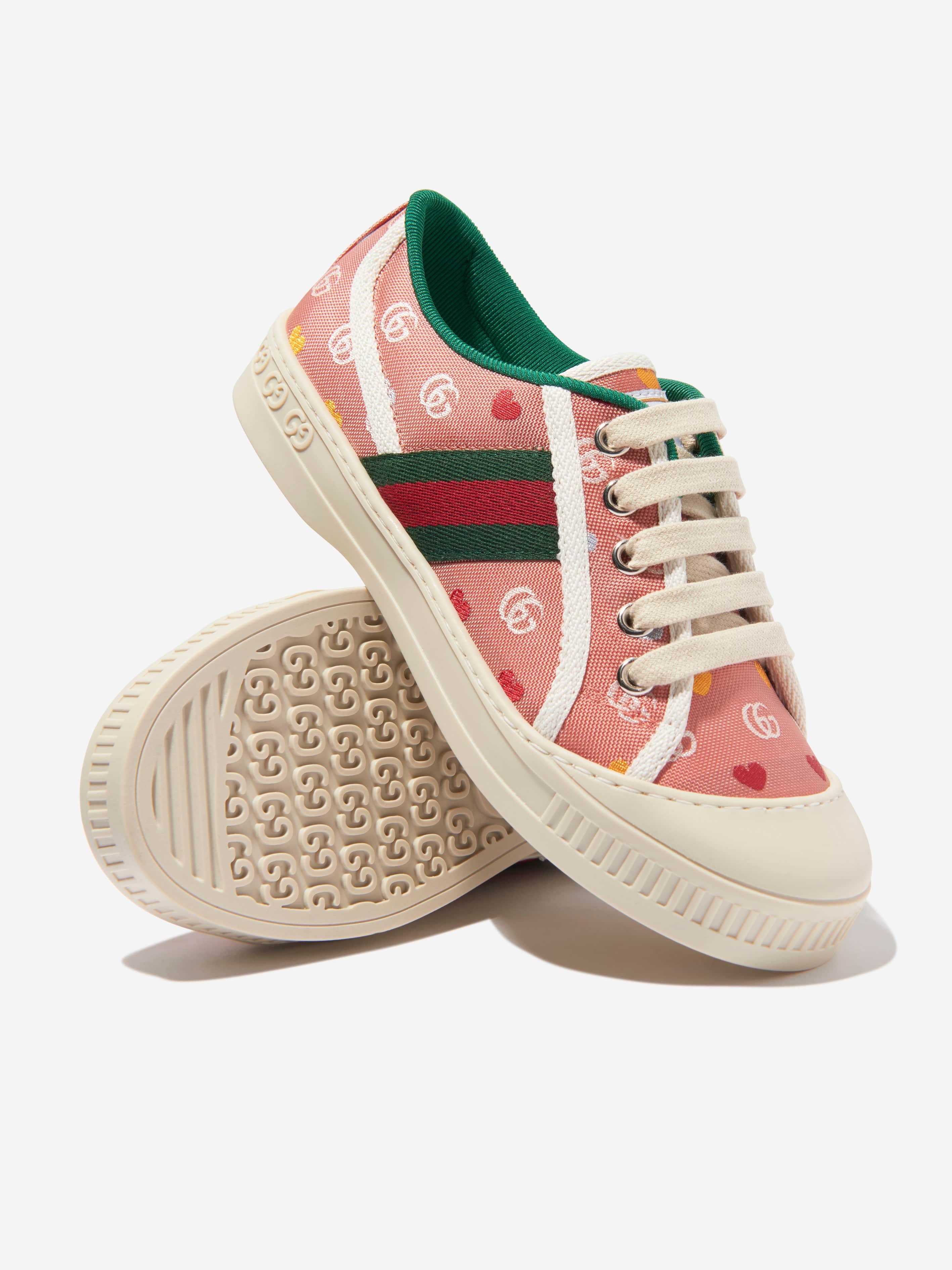 Pink best sale gucci trainers